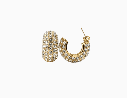 chunky statement semi hoop earrings covered in crystal stones made with 18 karat gold plated stainless steel