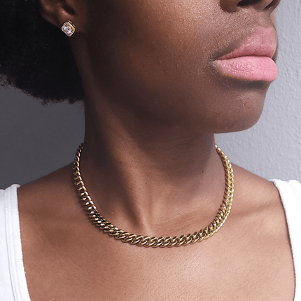 thick statement clavicle choker curb chain necklace made with 18 karat gold plated stainless steel