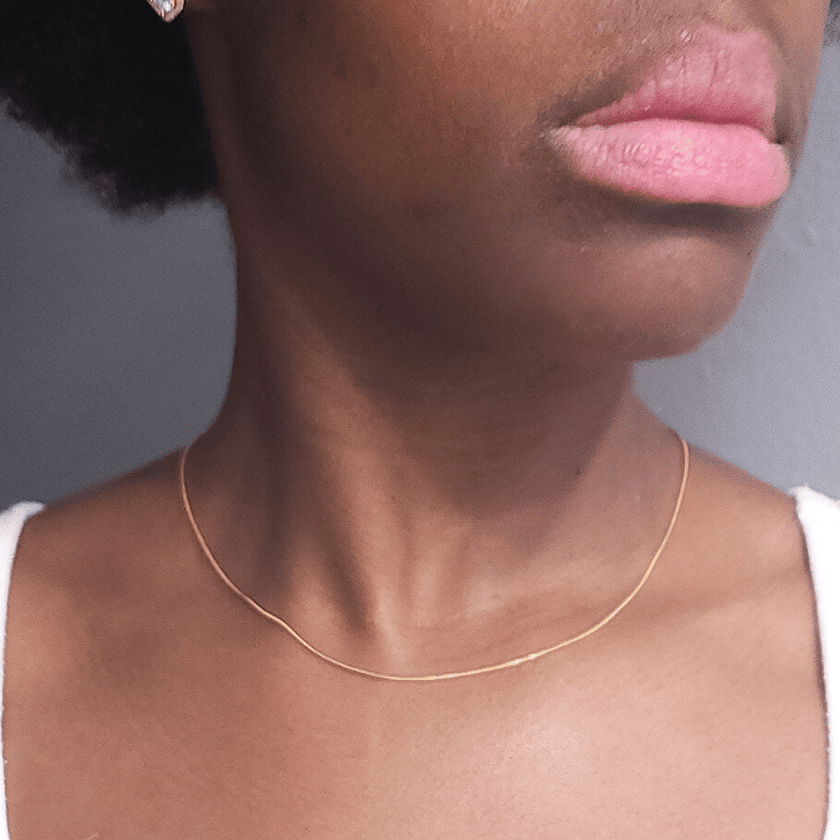 18 karat gold plated thin minimalistic snake chain necklace