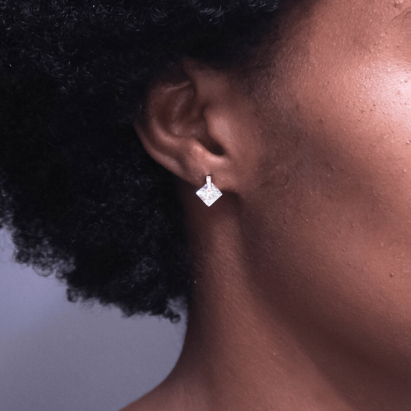 close up of unique water resistant waterproof anti-tarnish 14 karat gold sterling silver stud earrings