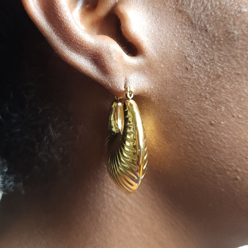 Woman wearing Twenty-Eight Minna Textured Chucky Hoops